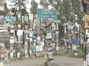 Started by a homesick soldier in 1942, it has become a custom in Watson Lake for visitors to hang a sign from their hometown. There are now 80,000 of them.